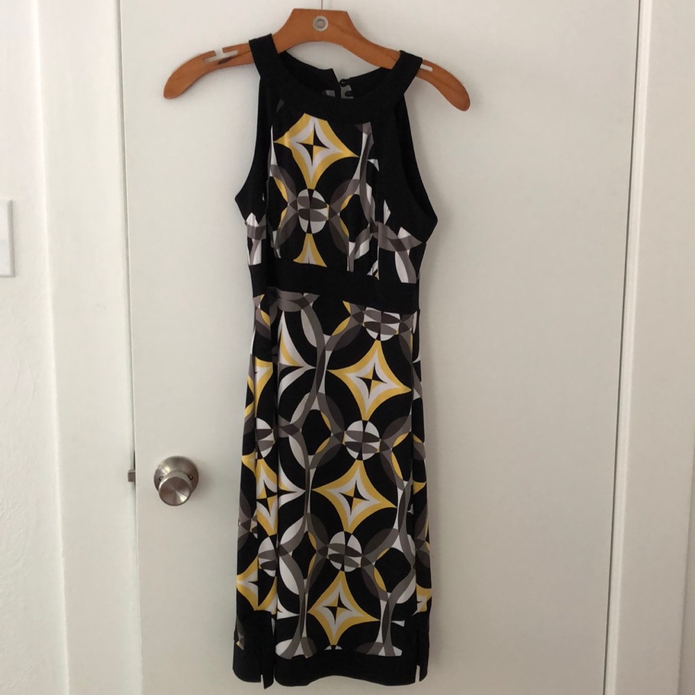 Black, white and yellow dress.
